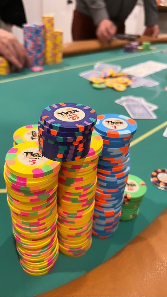 Deep stacks of chips racked up in front of a player